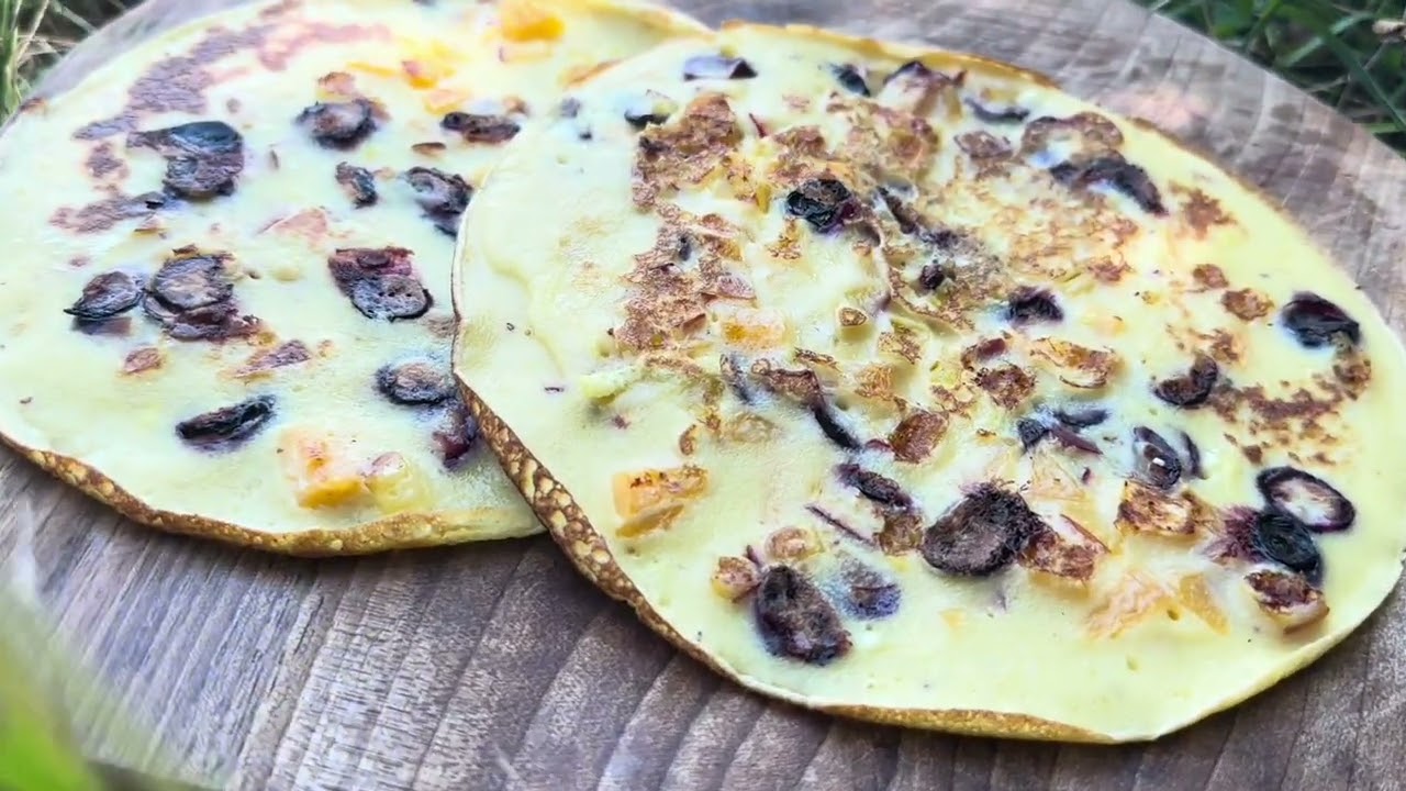 Pancakes with fruits and fried pancakes with ham and cheese