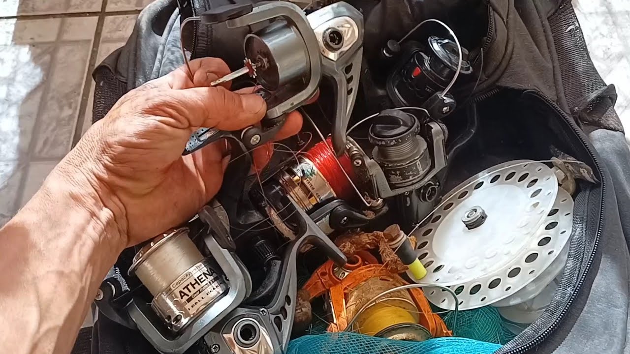 Manutenção de molinete, o carretel não sobe e não desce , reposição de peça e limpeza!