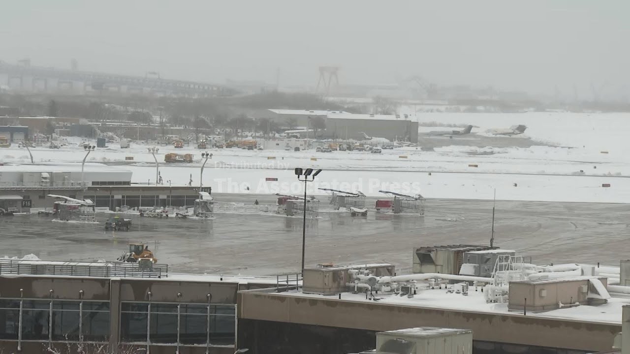 Crews work to clear snow from Philadelphia airport tarmac