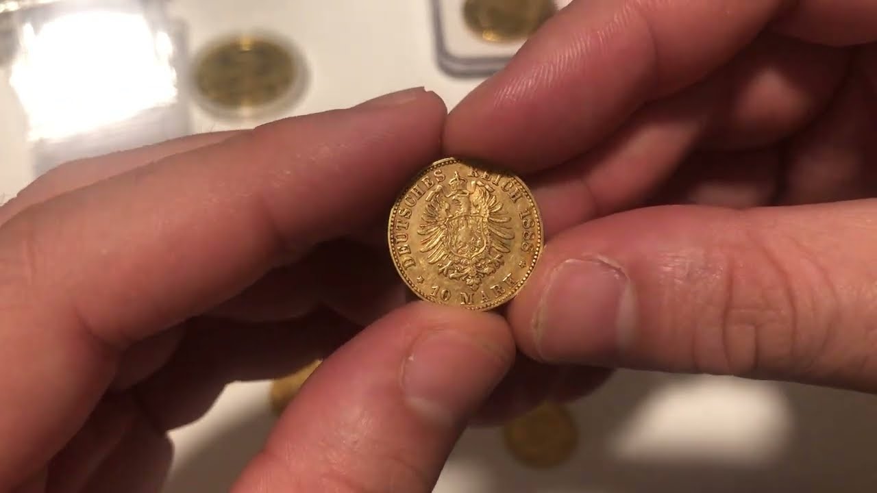 International Gold Coins, Gold Sovereigns, 1oz Gold Brit, Gold 50ps and some silver.