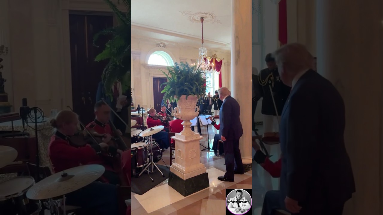 President Donald Trump stops to watch the United States Marine Band play God Bless America #trump