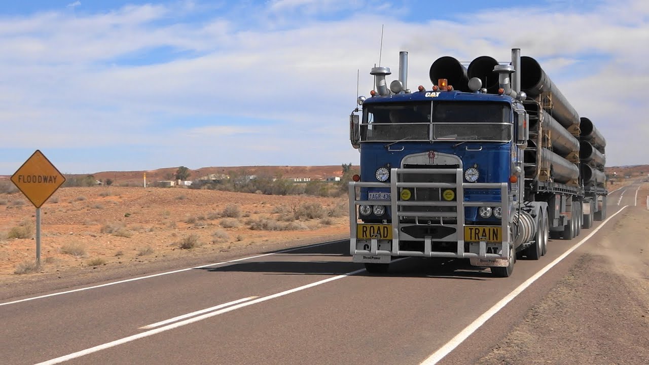 Like big trucks and  big V8s? Watch this! Bonus 35,000 ton iron ore train at the end.