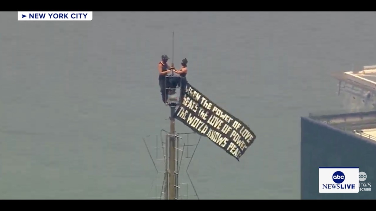 Two people climb Empire State Building