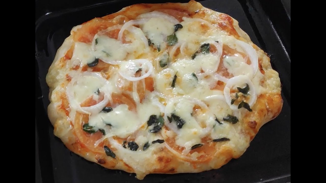 Pizza artesanal realizada en casa, fácil y versátil.