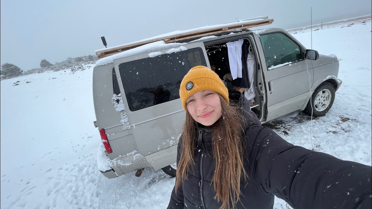 surviving my first winter storm ❄️ solo female vanlife in winter