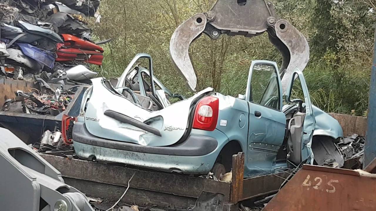cars crushed on the car scrapyard with djlau1