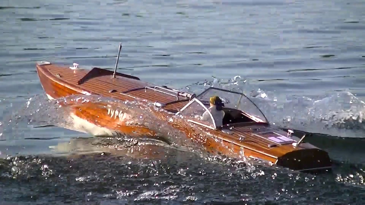 Sailing a nice Mahogany Runabout at the Lake