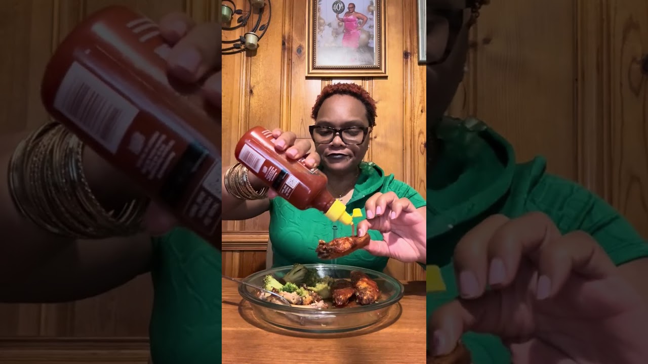 A fried wings with Sriracha sauce and broccoli ￼