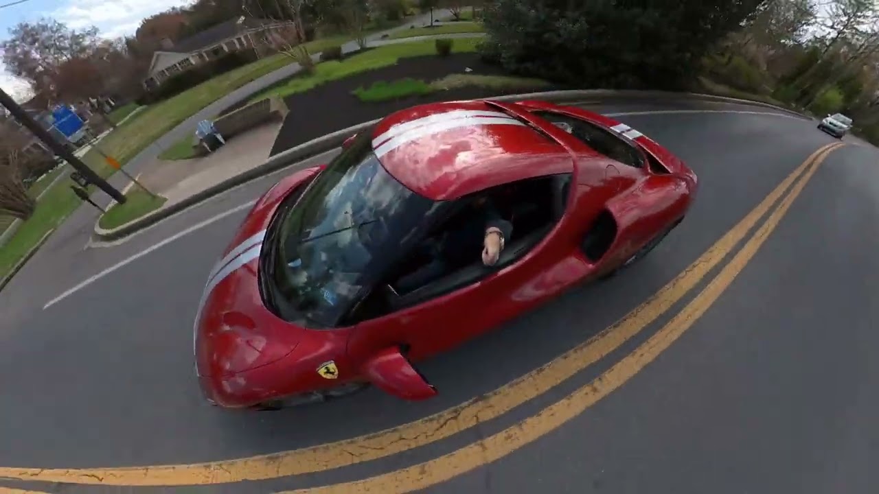test driving the Ferrari 296 GTB as a Scud owner, contrasting it