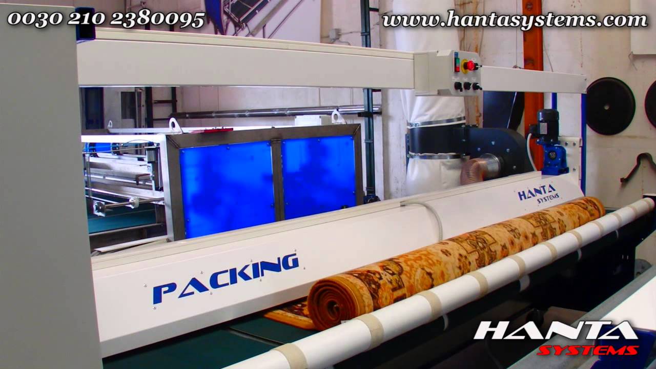 Automatic carpet and rug packing machine