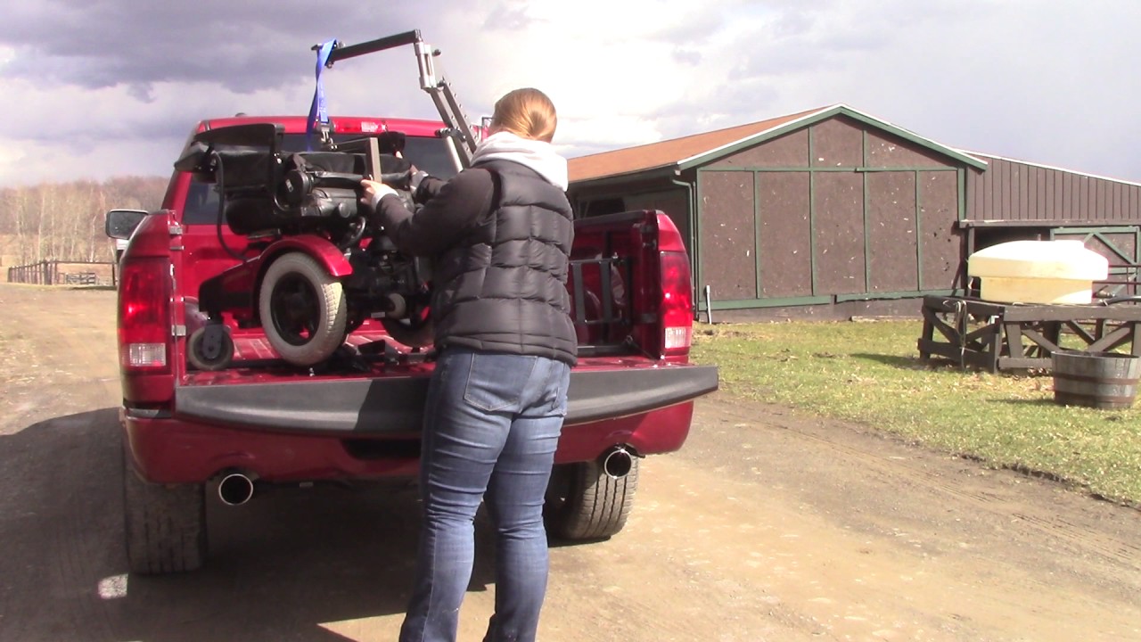 Multi-Lift PIR Scooter/Wheelchair lift entering 2014 Dodge Ram  truck bed
