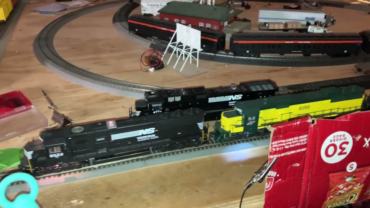 A trio of sd 60s pulling a long train