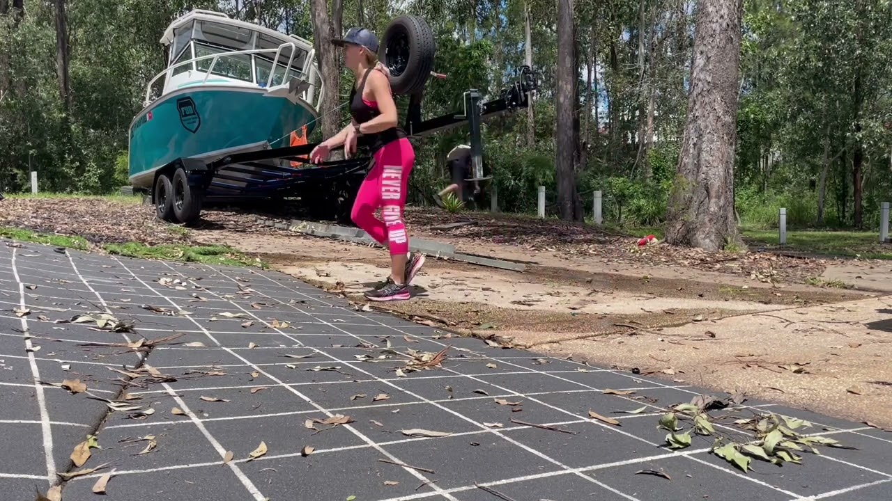 Winching a boat off the ground onto a trailer