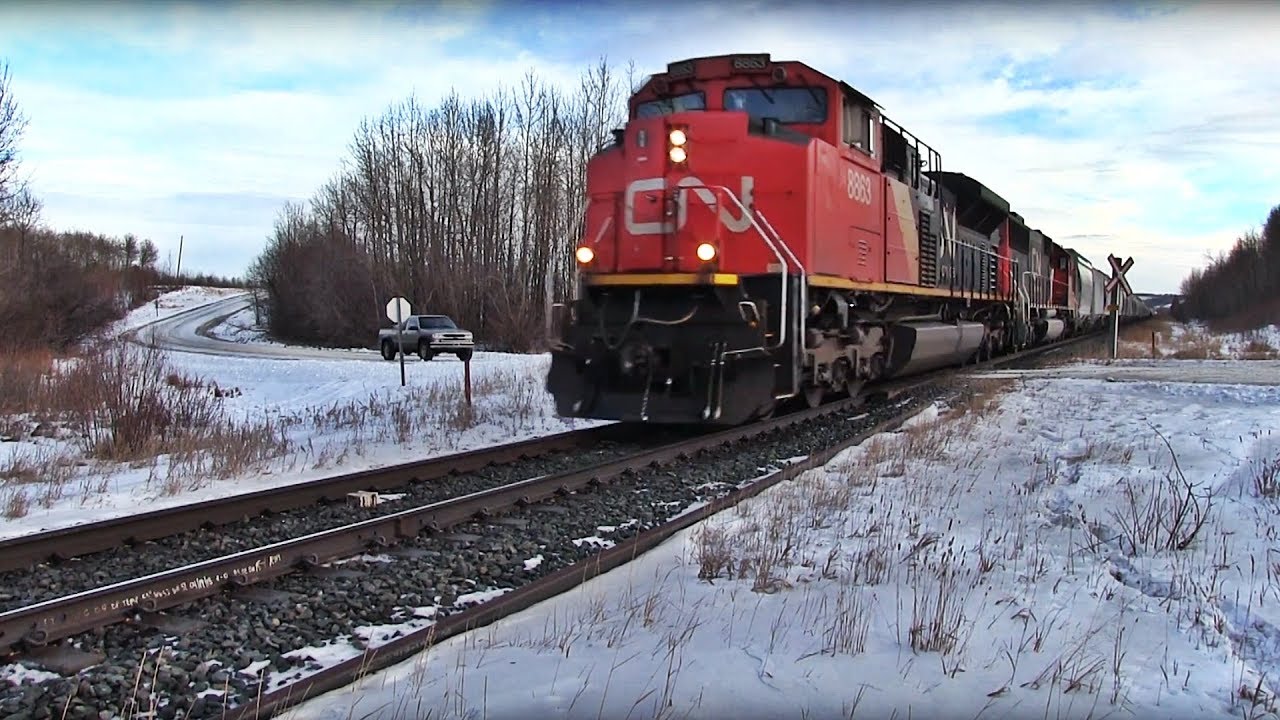 CN 8863 West Faces Truck With Train Horn At Grade Crossing At Entwistle Alberta