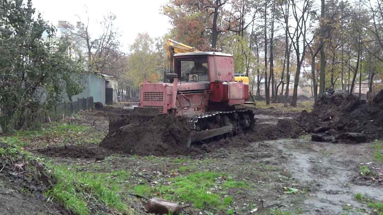 Old Soviet bulldozer DT 75 at work