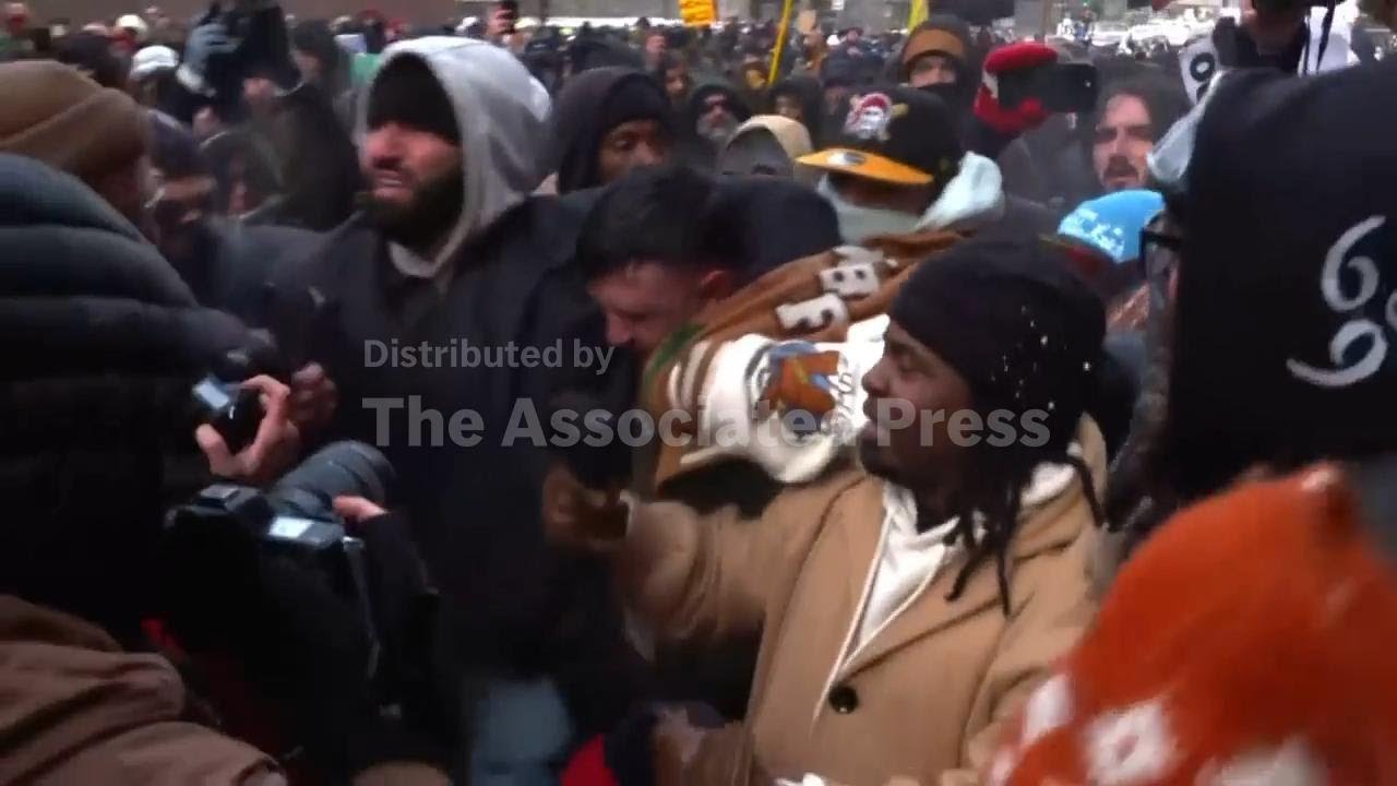 Counter protesters chase off conservative influencer during Minneapolis immigration crackdown