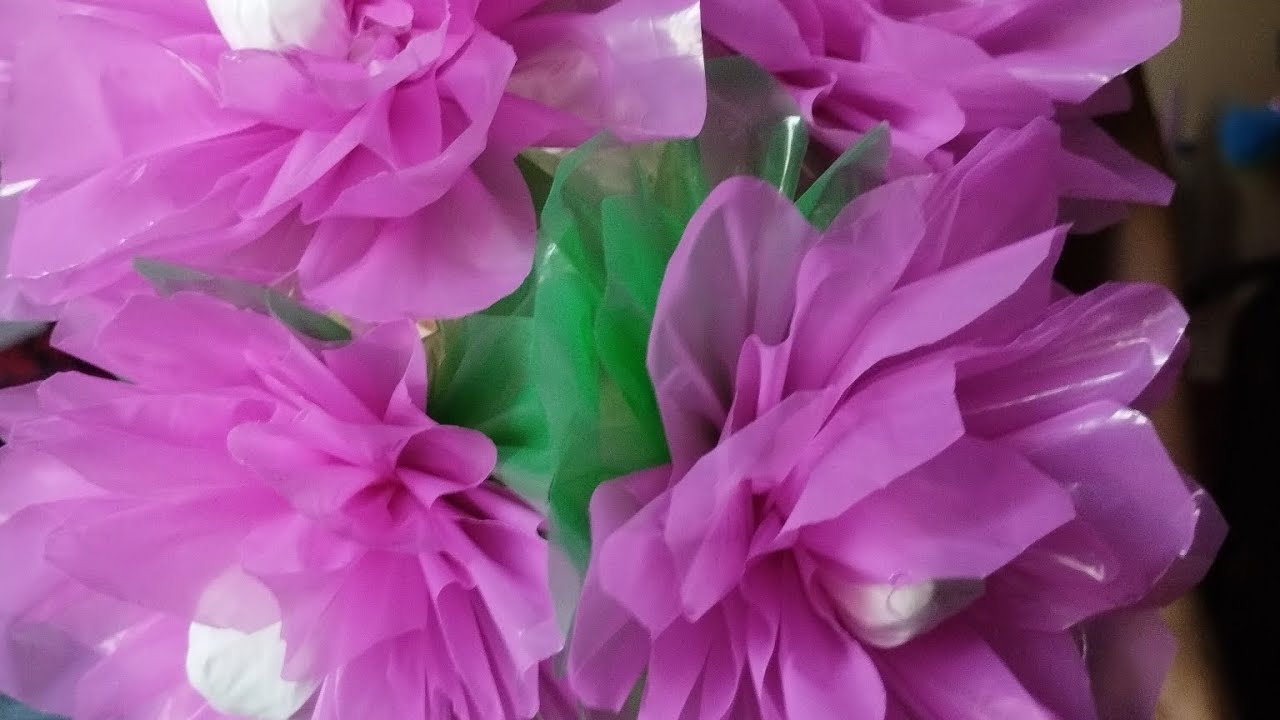 Flor 🪷 de plástico con bolita al centro 🏵️