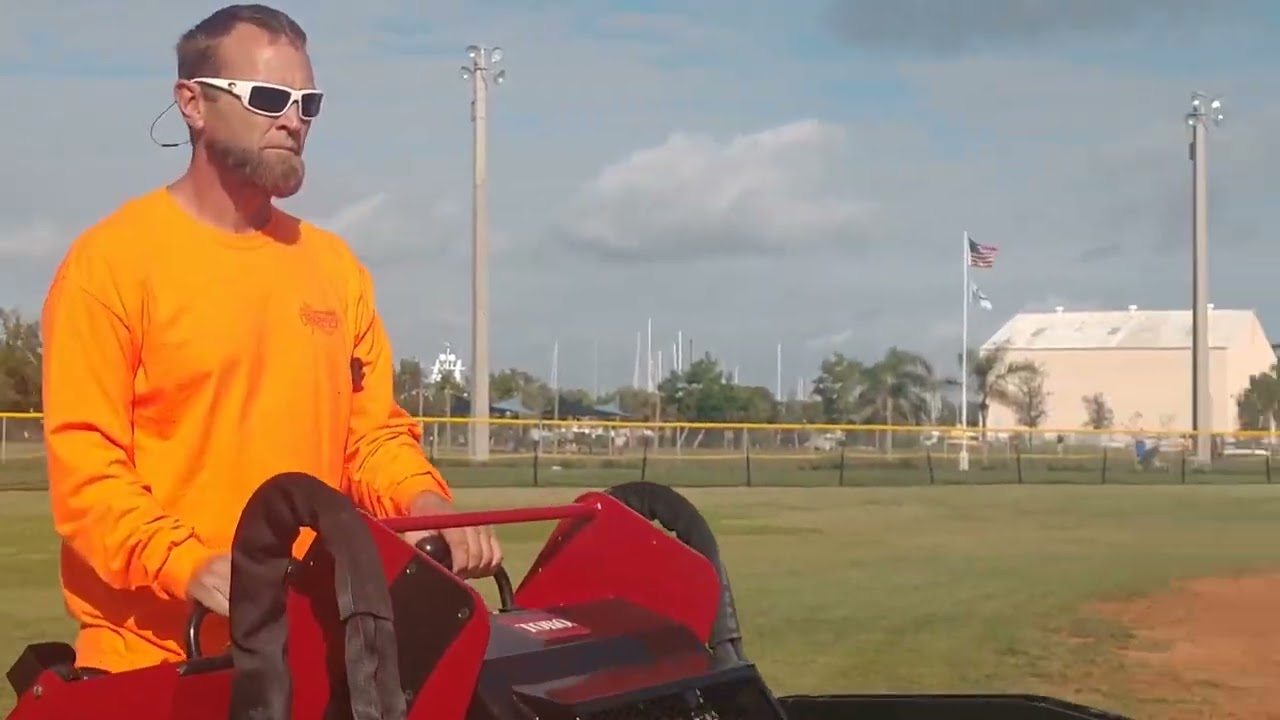 Toro Dingo with Grapple Rake