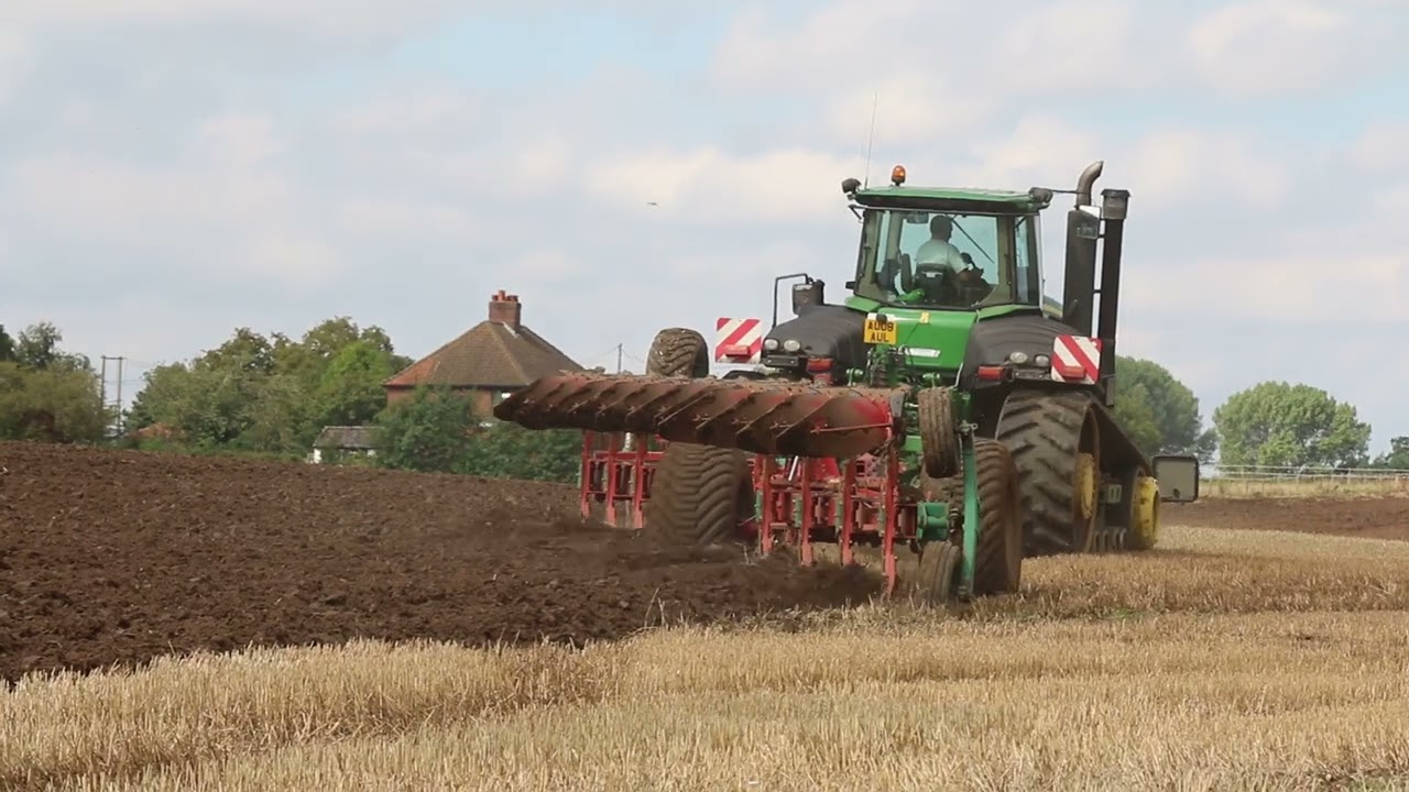 TRACTORS PLOUGHING 1