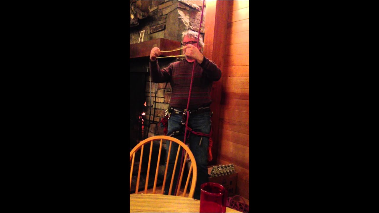 Rope ascension system with an auto-blocking belay device