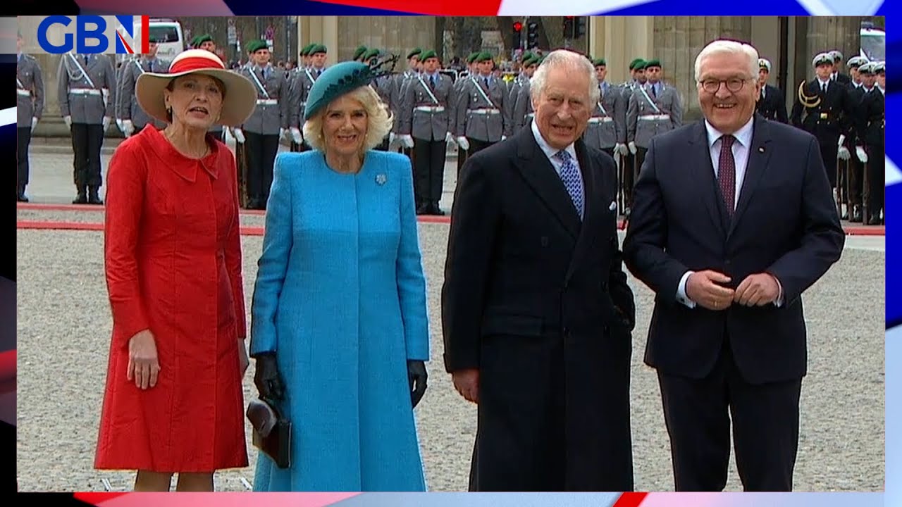King Charles and Camilla are greeted by German President Frank-Walter Steinmeier at Brandenburg Gate