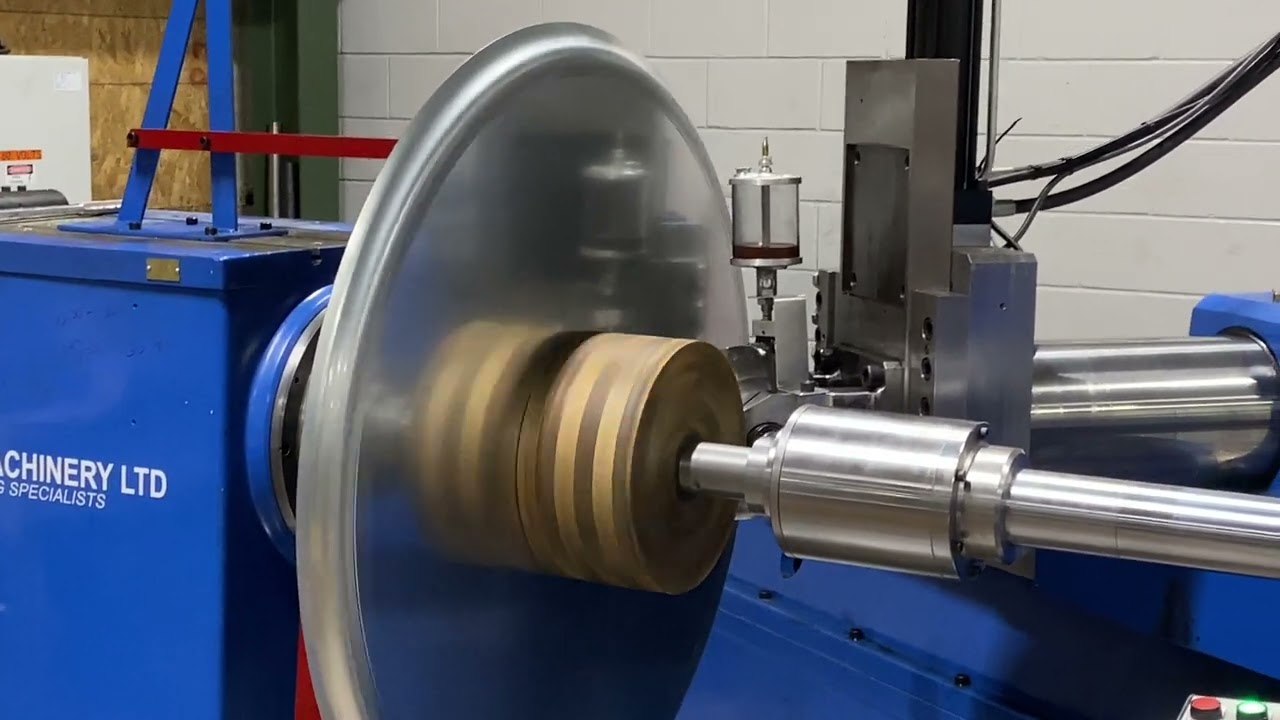 Acme’s new PNC 1200 Automatic CNC Spinning Machine 96” diameter capacity.