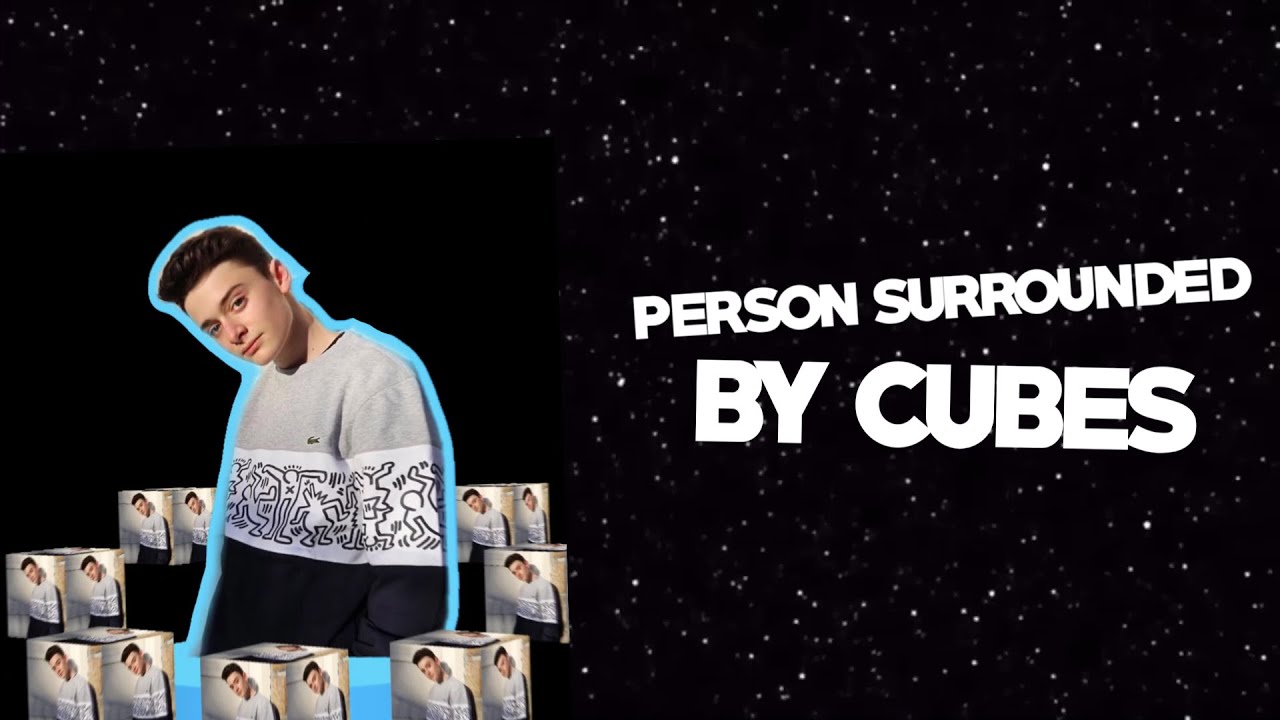 person surrounded by cubes transition