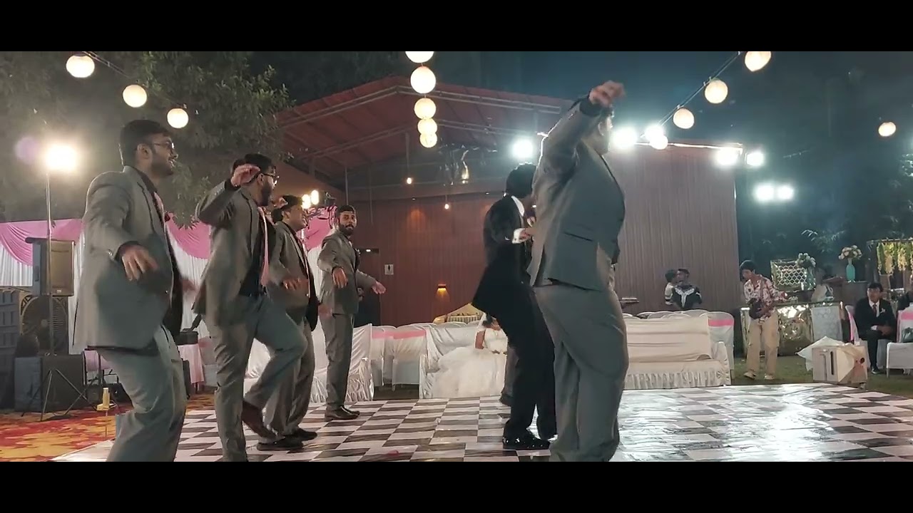 Harun's friends dance 