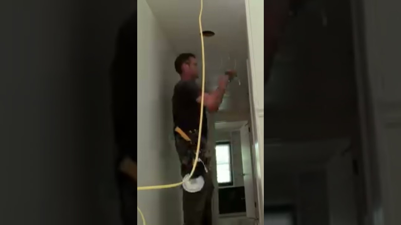 Recessed Lighting installation in hallway