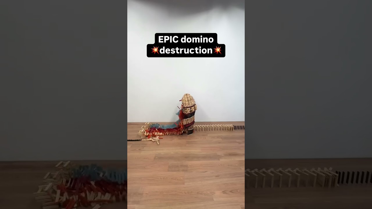 Satisfying domino tricks done with wooden boards. 