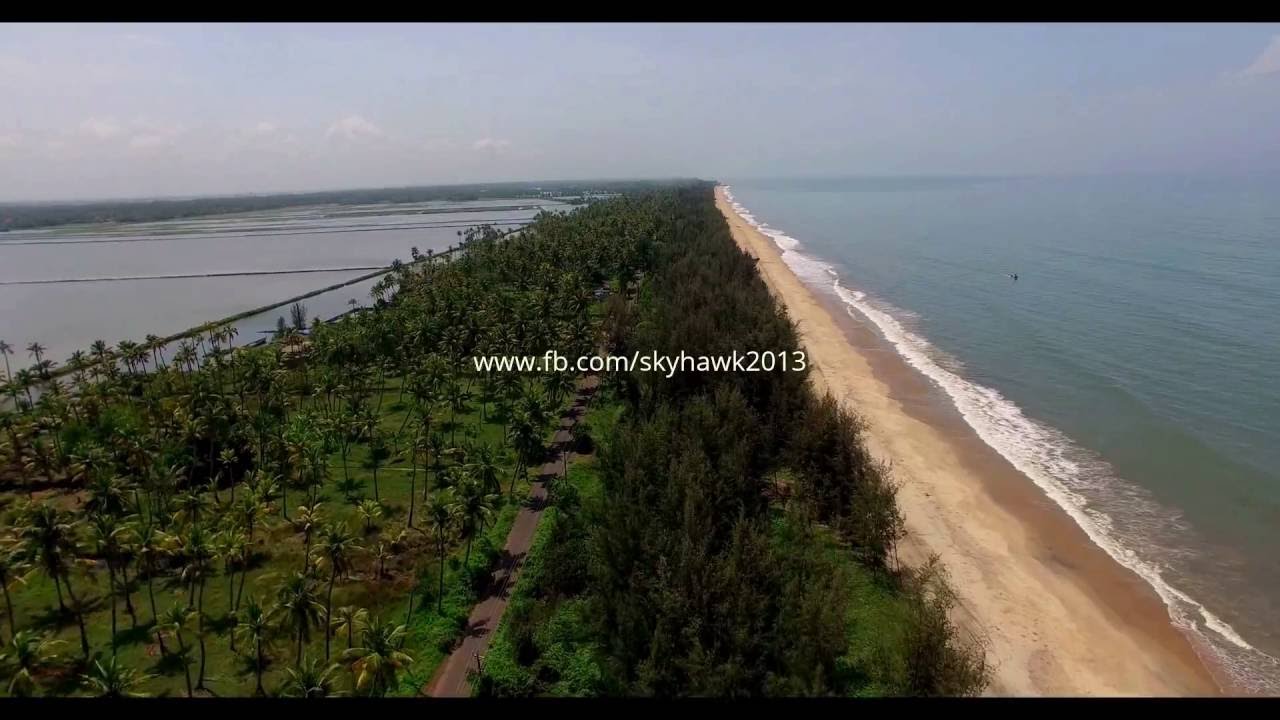 Exclusive view of Kerala backwaters and the sea in one frame.Aerial stock  footage 4K