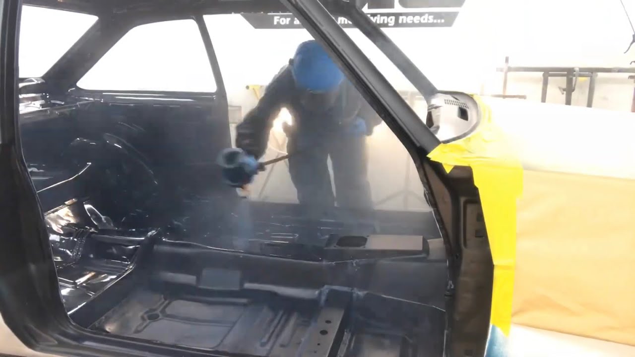 Seam seal and Spraying mk2 escort floor and spraying midnight blue after epoxy , urethane primer
