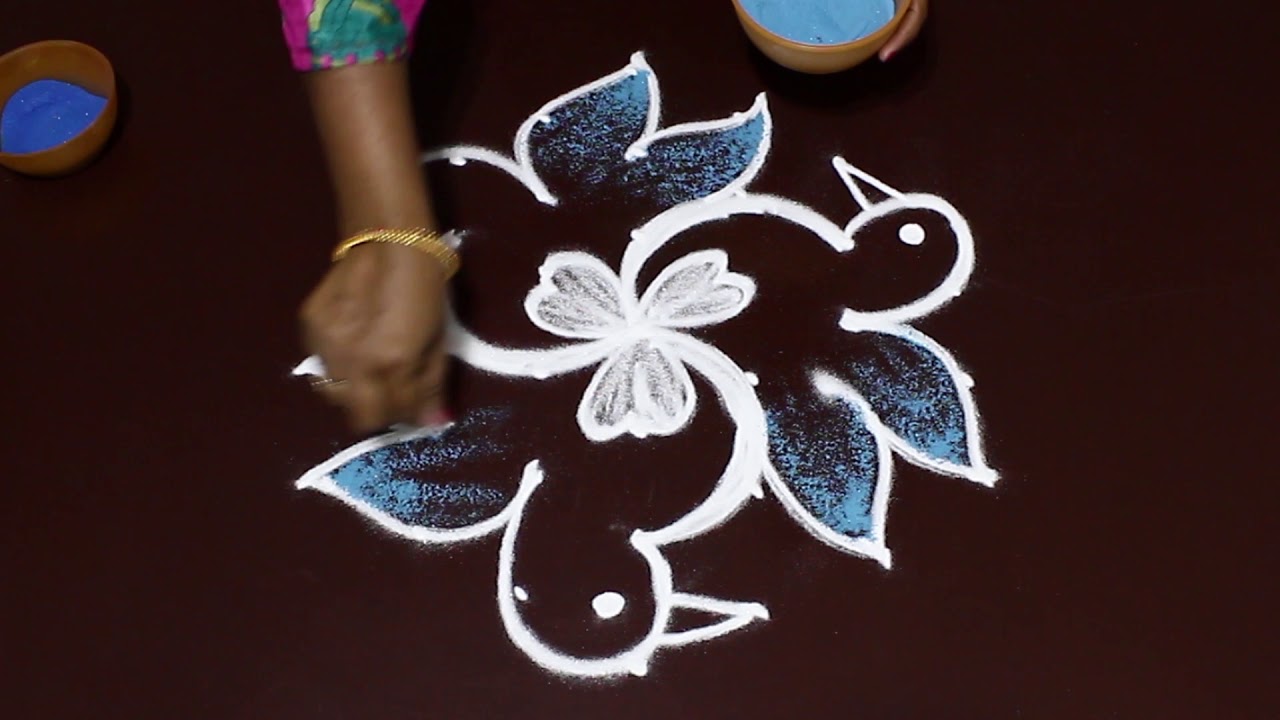 Cute Birds Rangoli with 7 to 4 dots interlaced