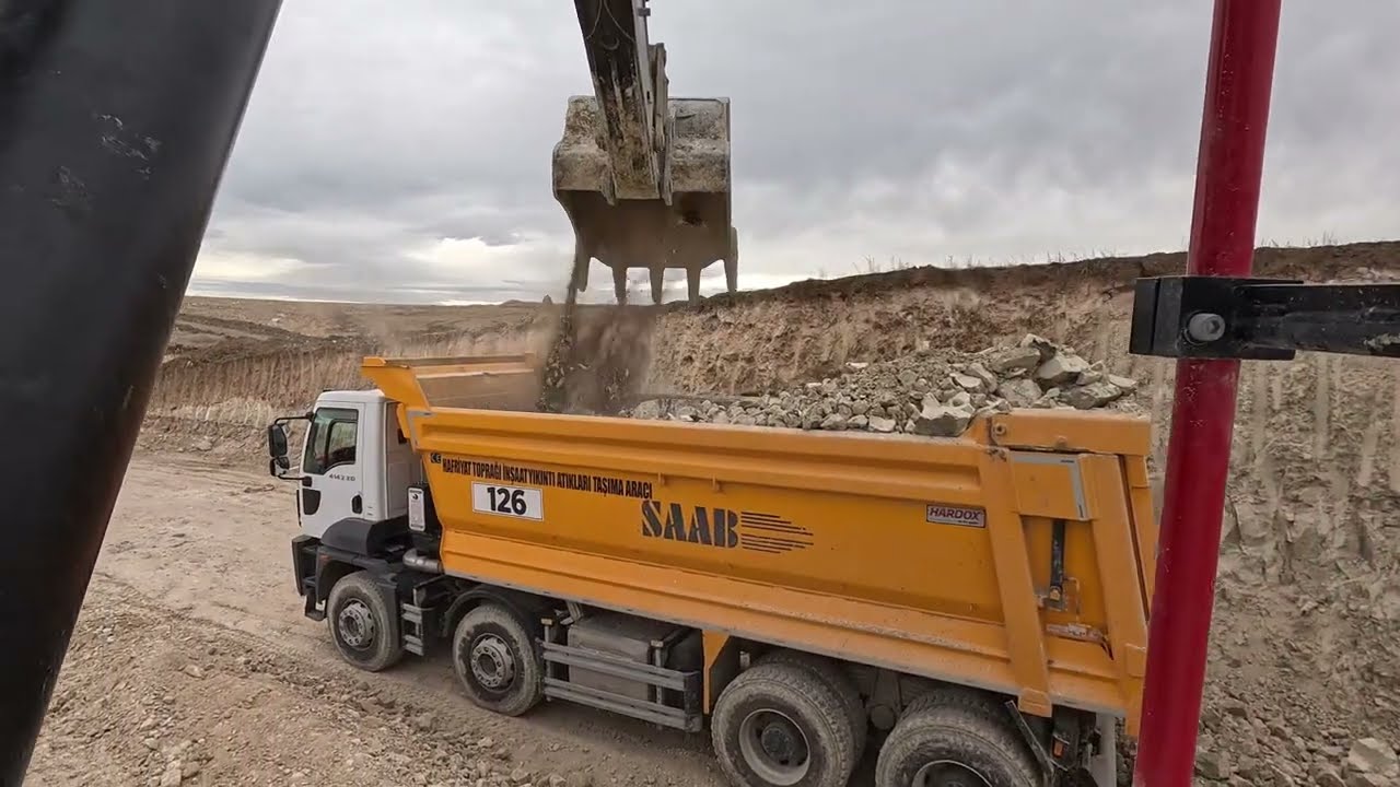 Экскаватор Hidromek Двусторонняя загрузка самосвала