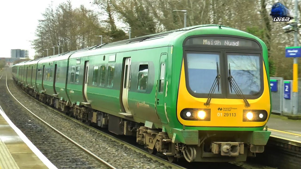 Trains and Manual Railroad Crossing in Ashtown Train Station, Dublin - 22 January 2023