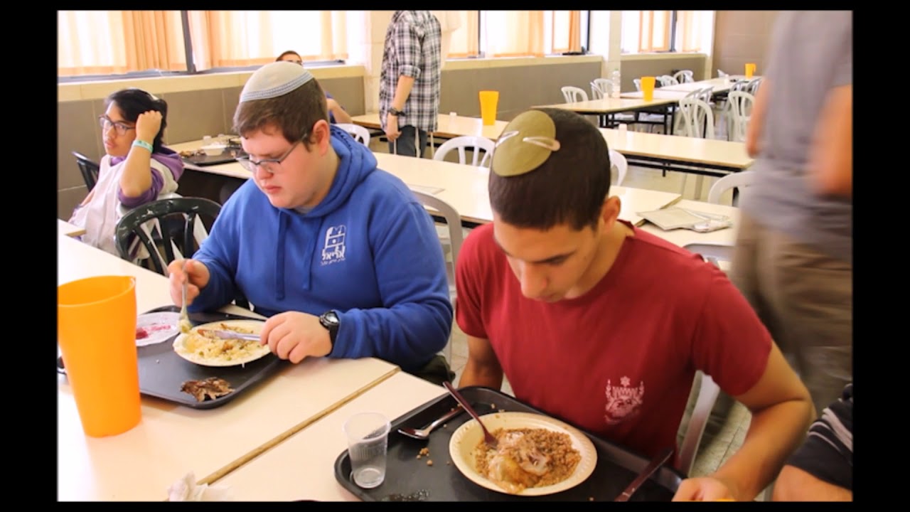 כ