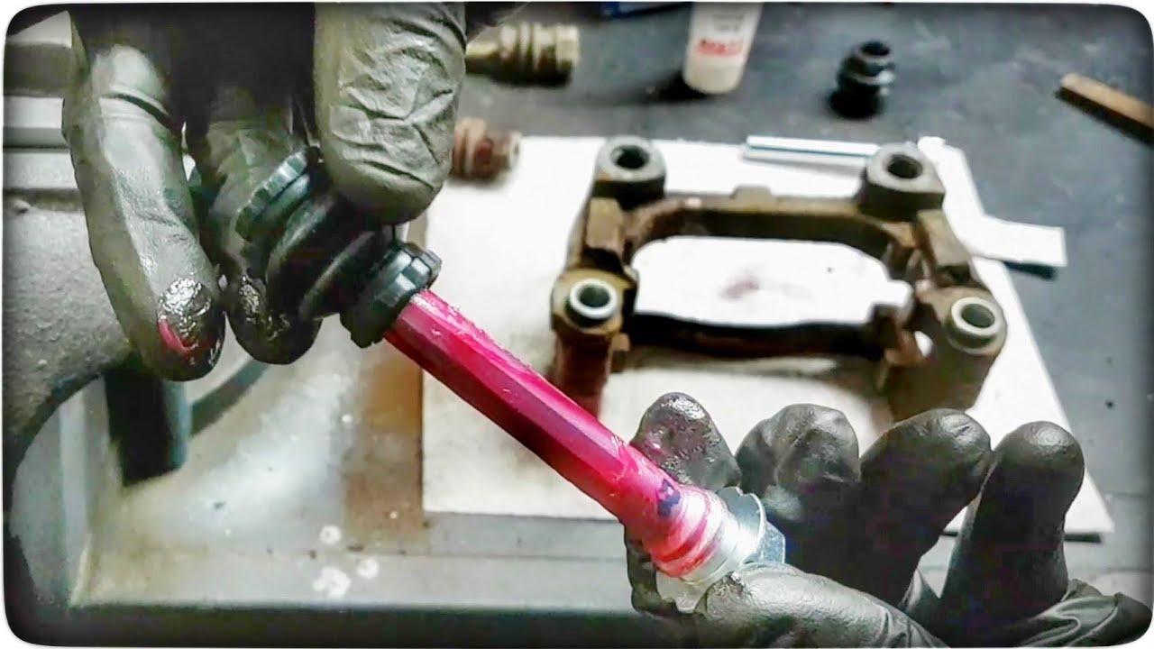 Jak wymienić prowadnice zacisku hamulcowego w Opel Astra G II | ForumWiedzy