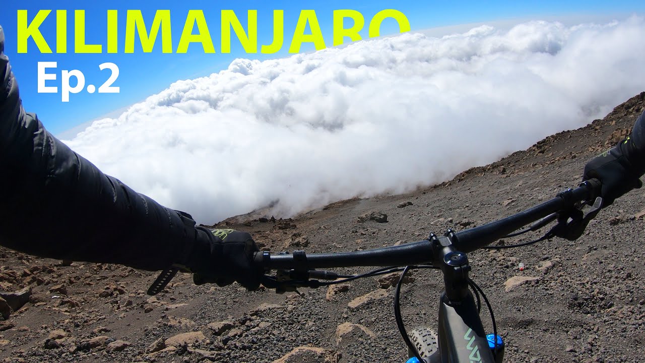 Kilimanjaro 5.895 metri s.l.m on top with my MTB [orbea Occam]