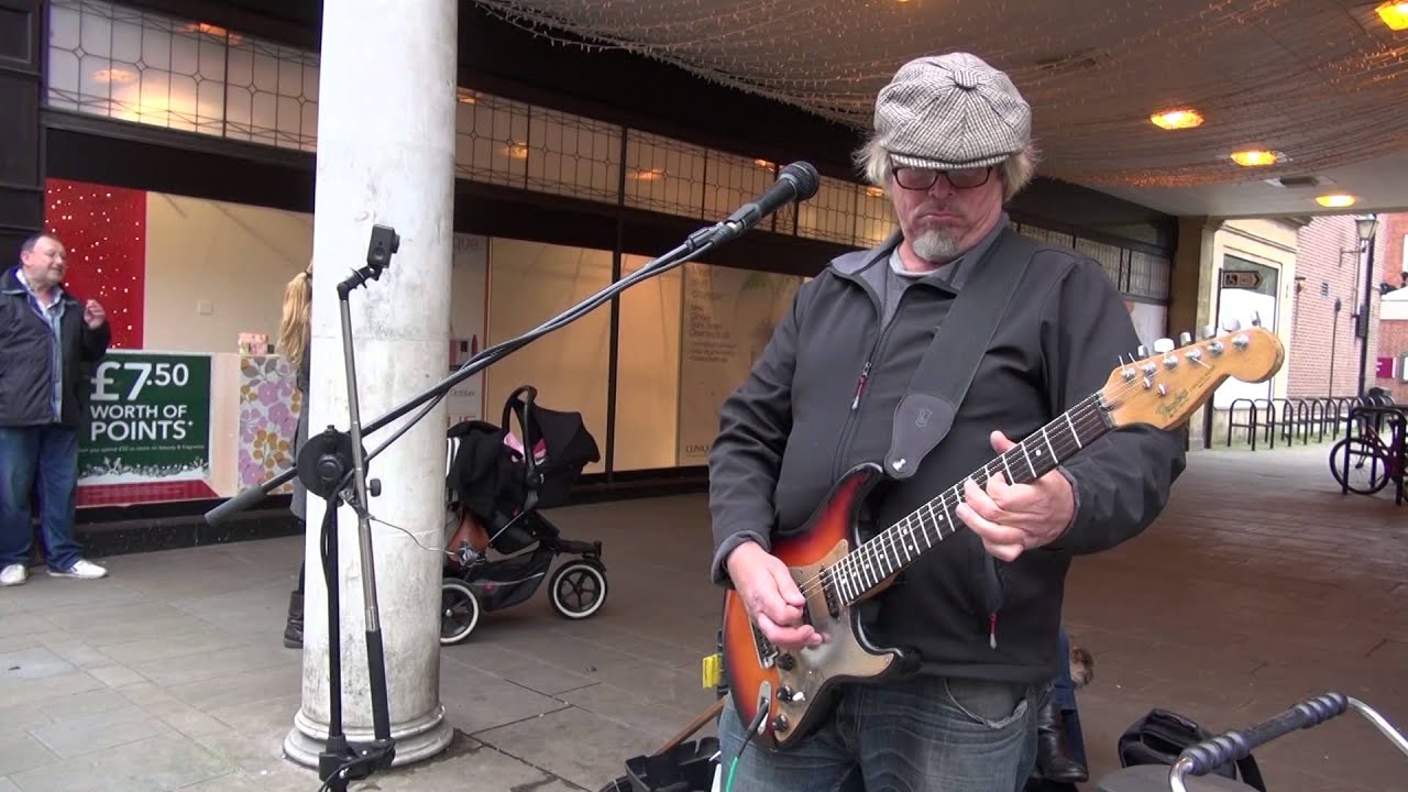 Busker, plays Gary Moore Still got the Blues in Winchester