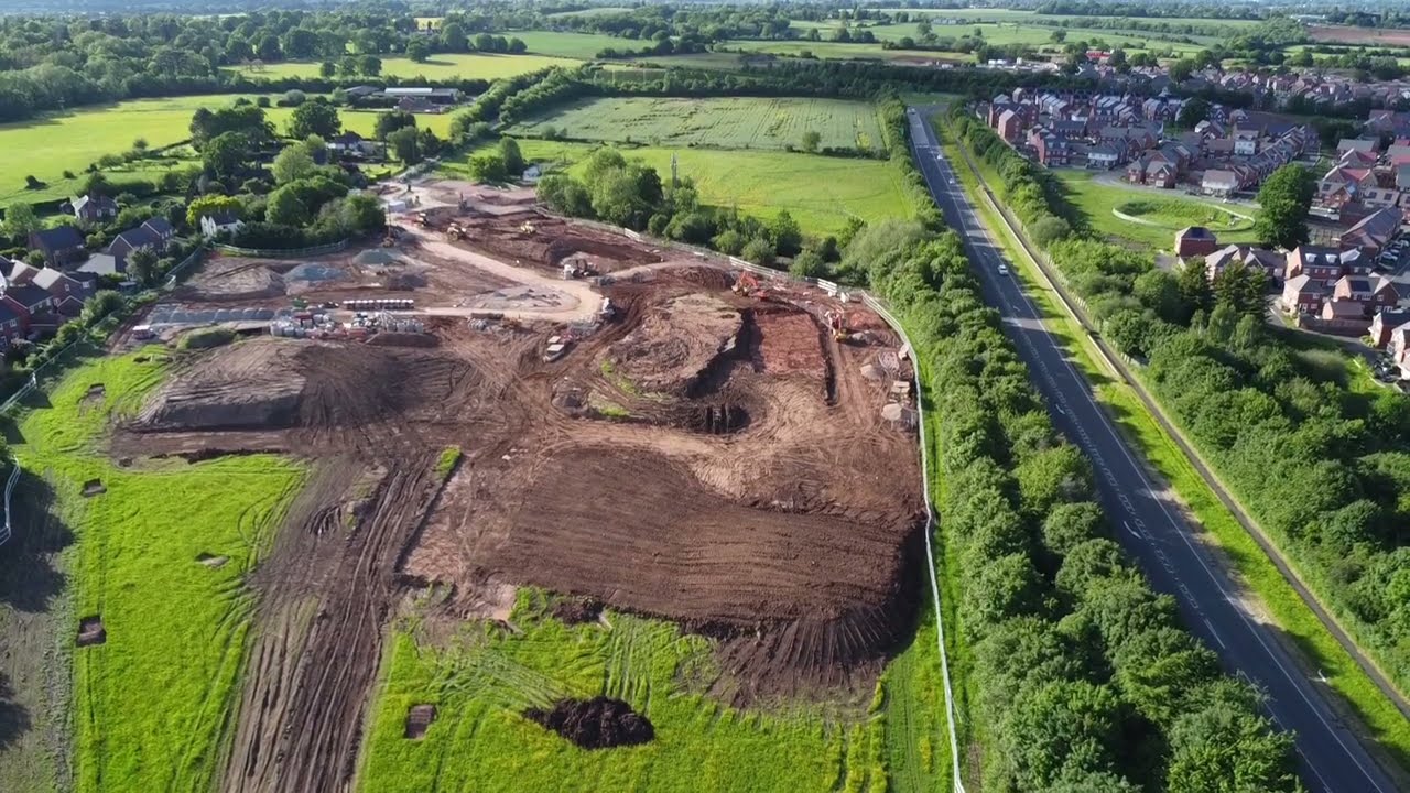 The village of Rushwick and its development in the fields behind The Whitehall Inn by drone.