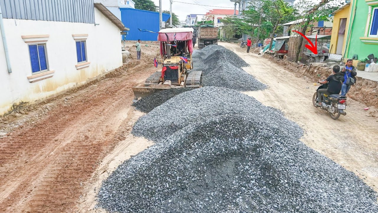 Perfect Action Process build foundation road in Village Spreading gravel by KOMATSU Dozer,25T Trucks
