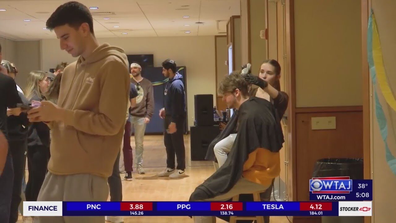 Penn State students shave heads before THON weekend