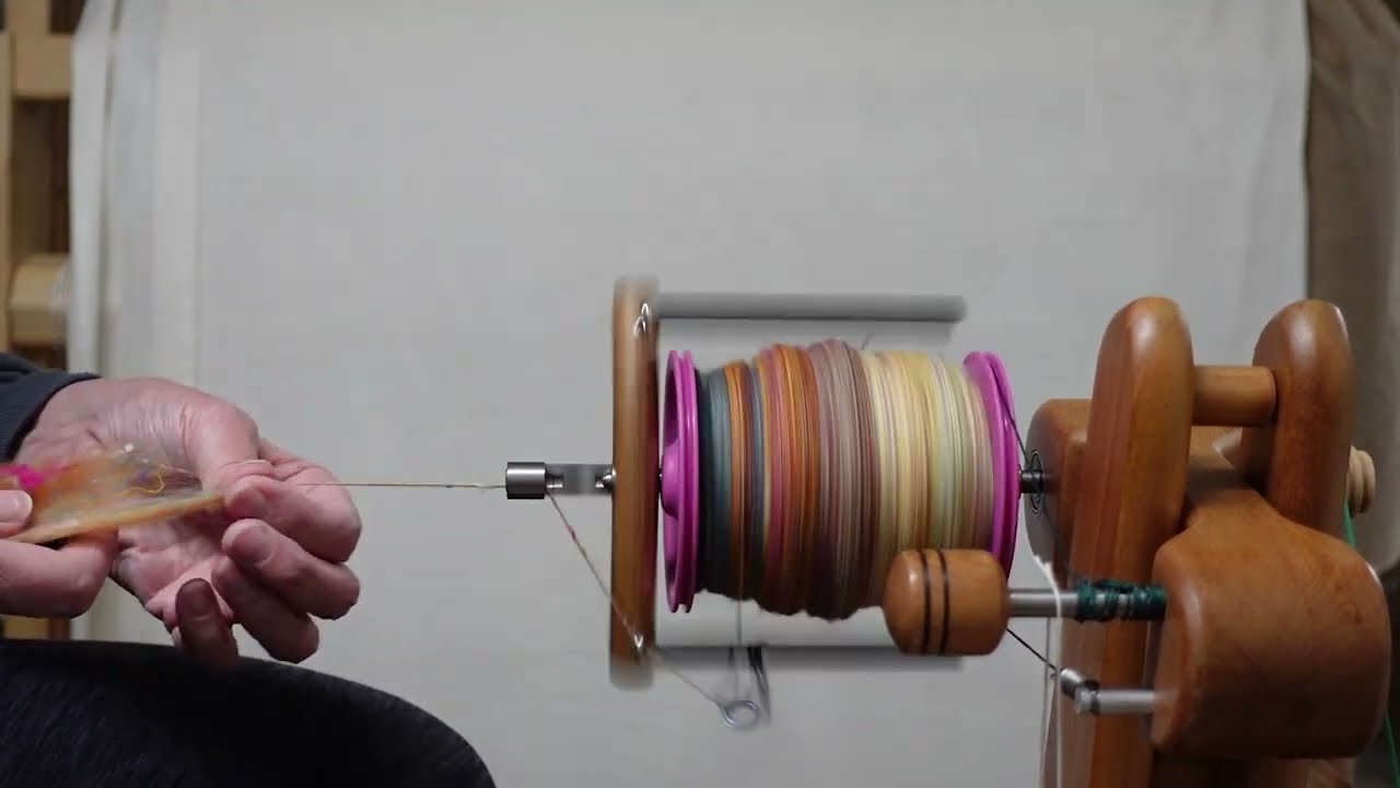 Spinning yarn on my Majacraft Rose spinning wheel - No chat.