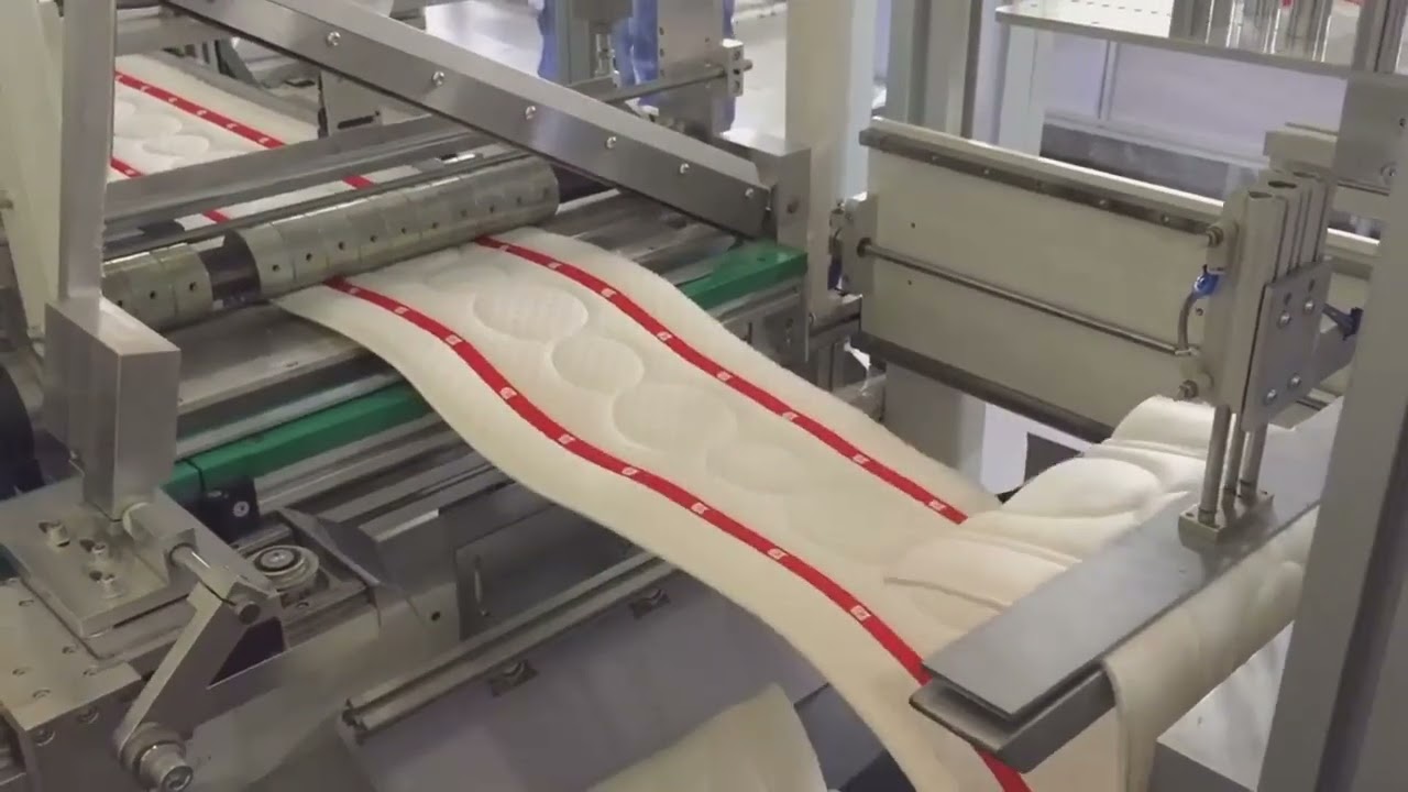 TEKNOMAC www.teknomac.it Handle-attaching machine (VERTICAL AND HORIZONTAL HANDLES)