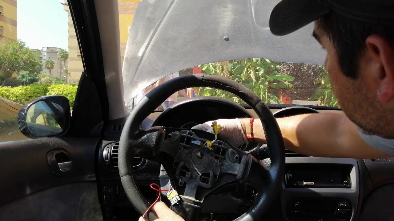 Cambio de volante Peugeot 206