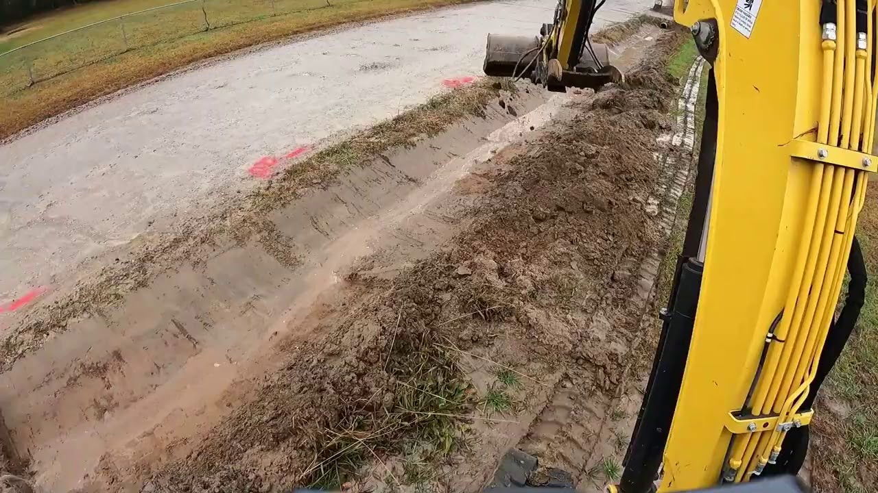 Cleaning Out A Silted In Ditch