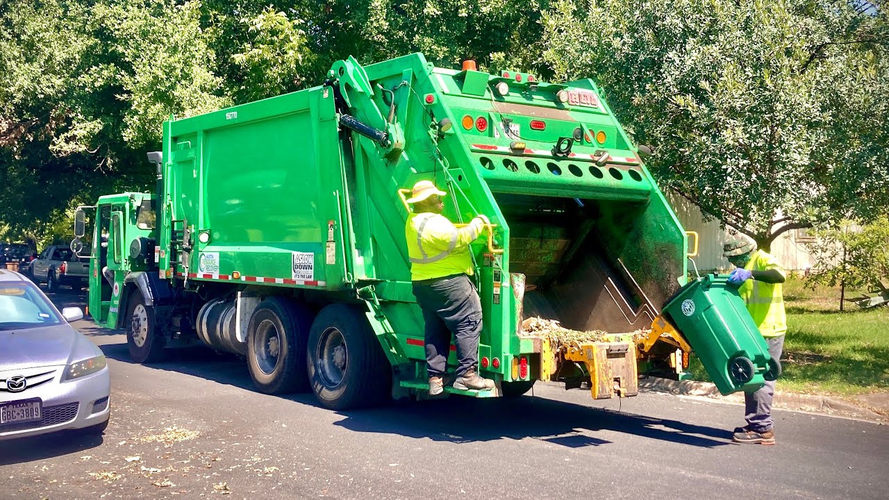 Austin Green Rear Loading Garbage Trucks Throwing Down Hood Recycle/Organics