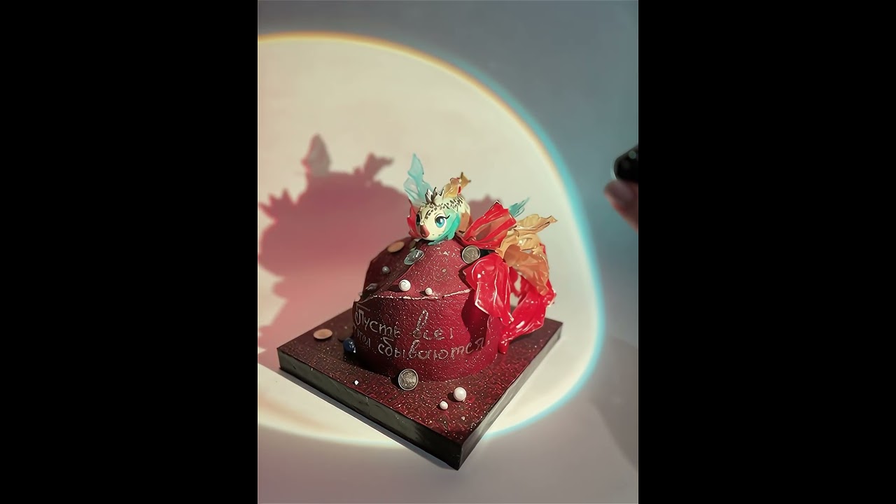 My cake and the figurine I sculpted by hand, brought to life with AI. 