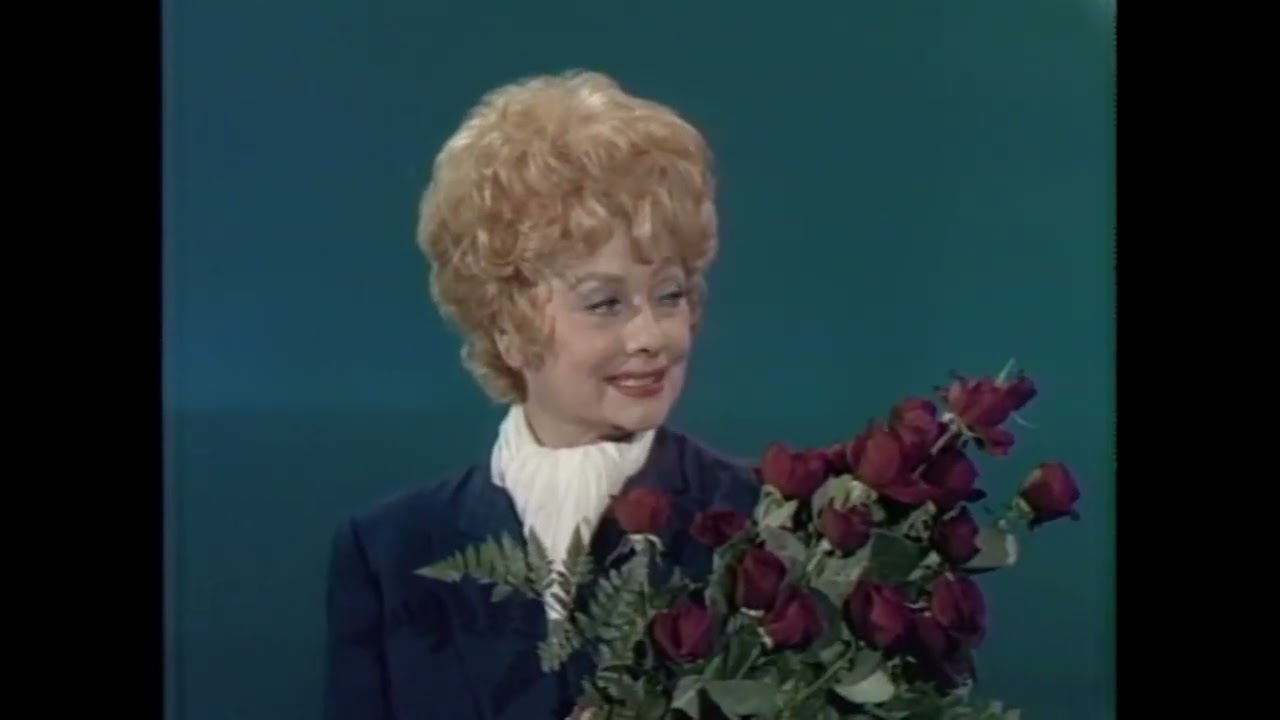 Glen Campbell and Lucille Ball.  Glen sings For all we know.  1971