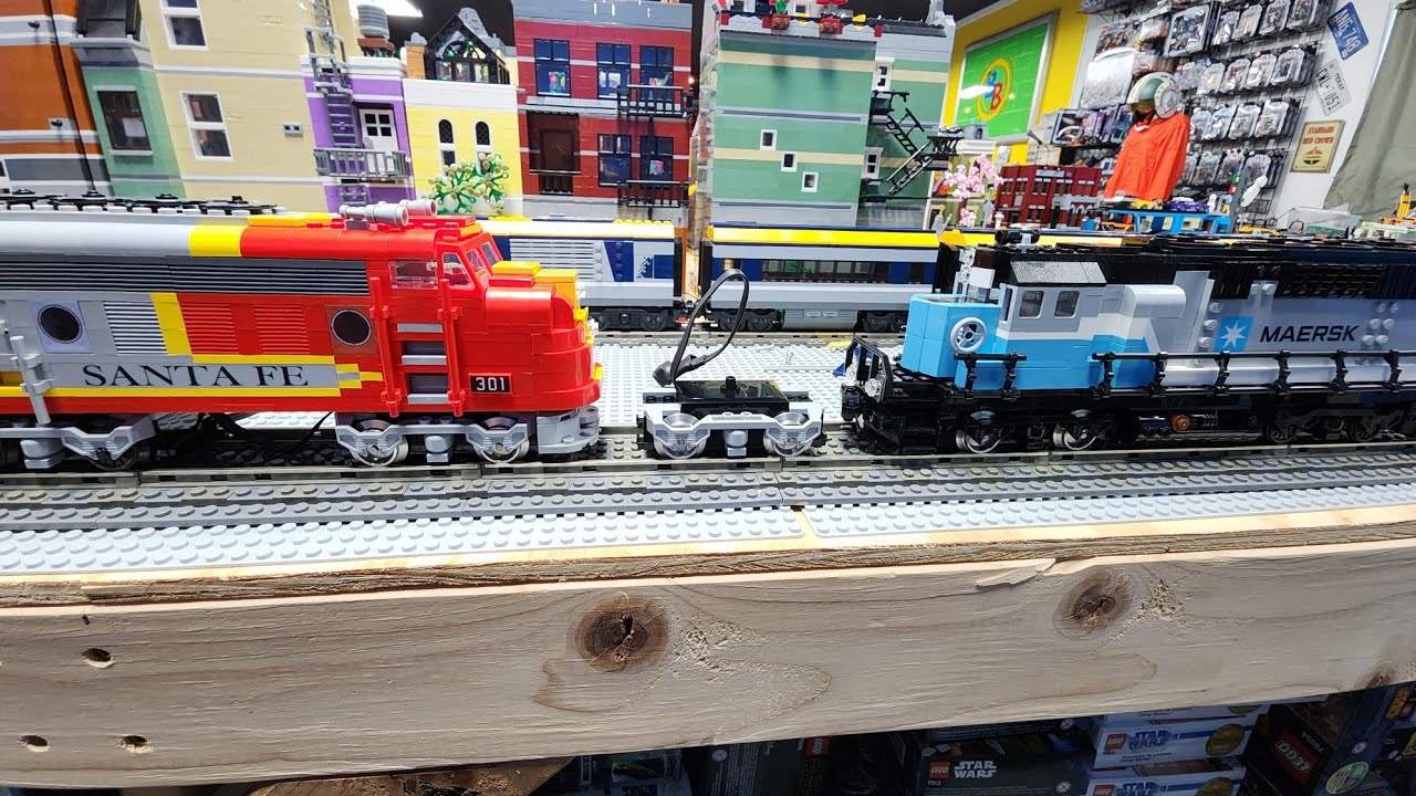 How I made a Lego 9Volt train power pickup using a old train motor box.